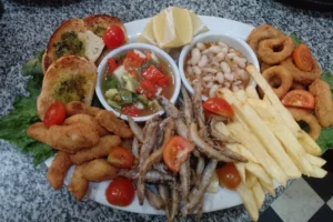 Macedonio Resto Picada Caliente
